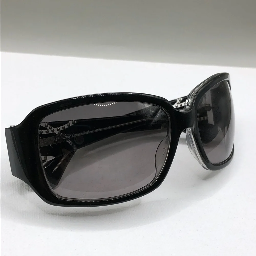 CALVIN KLEIN Collection 976 Sunglasses in color 038 Black Crystal Square Italy